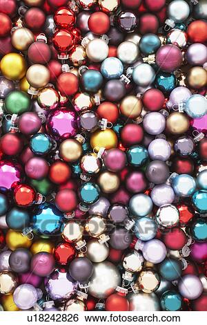 Pile of Christmas baubles, full frame View Large Photo Image Stock Photograph - Pile of Christmas baubles, full frame. Fotosearch
