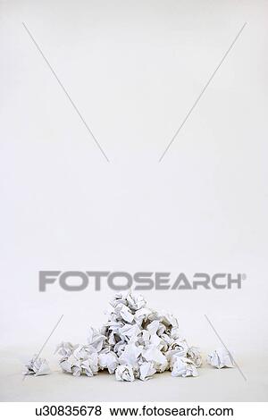 Stock Photo - Pile of crumpled paper, on white background. Fotosearch