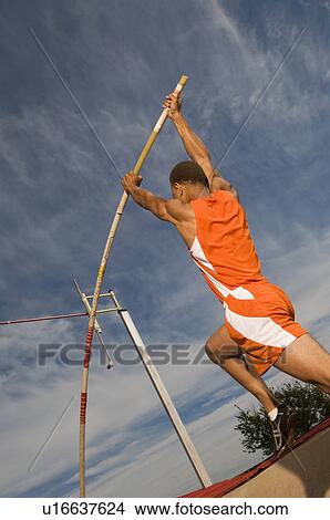 Pole vaulted taking off View Large Photo Image Picture - Pole vaulted taking off. Fotosearch