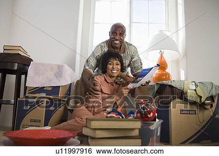 Portrait of middle-aged couple in new apparent View Large Photo Image Stock Photograph - Portrait of middle-aged couple in new apparent. Fotosearch