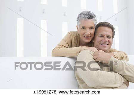 Stock Photo - Portrait of middle-aged couple. Fotosearch