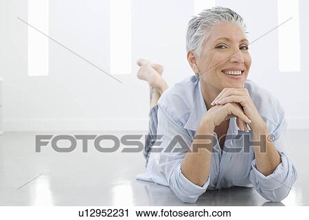 Portrait of middle-aged woman View Large Photo Image Stock Image - Portrait of middle-aged woman. Fotosearch