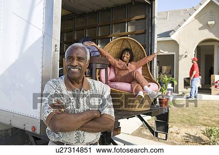 Portrait of middleaged couple, lady on lorry View Large Photo Image Stock Image - Portrait of middleaged couple, lady on lorry. Fotosearch