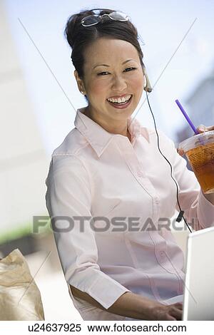 Portrait of young businesswoman having lunch break View Large Photo Image Stock Photography - Portrait of young businesswoman having lunch break. Fotosearch