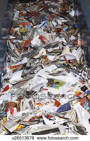 Stock Photo - Recycled paper on conveyor belt. Fotosearch