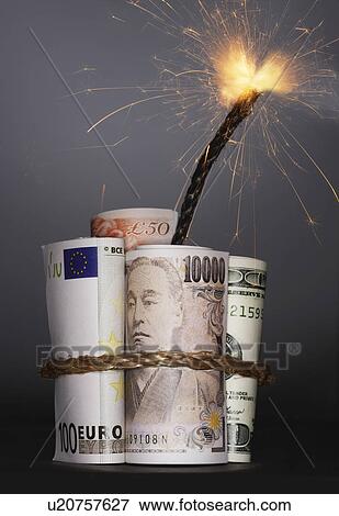 Rolls of money symbolizing dynamite with lit fuse, in studio View Large Photo Image Stock Photo - Rolls of money symbolizing dynamite with lit fuse, in studio. Fotosearch