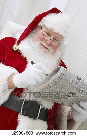 Santa Claus Reading Newspaper View Large Photo Image Stock Image - Santa Claus Reading Newspaper. Fotosearch