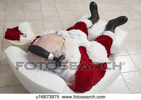 Santa Claus Relaxing in Armchair View Large Photo Image Stock Photography - Santa Claus Relaxing in Armchair. Fotosearch