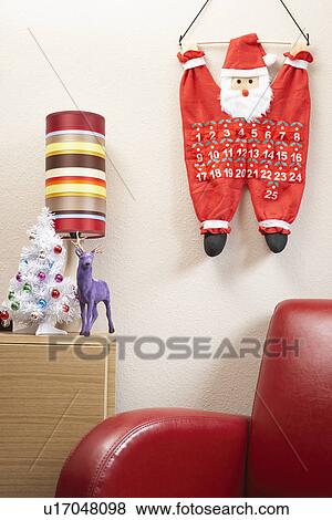 Santa clause calendar hanging on wall View Large Photo Image Stock Photo - Santa clause calendar hanging on wall. Fotosearch
