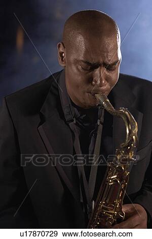 Saxophonist Playing Jazz View Large Photo Image Stock Photo - Saxophonist Playing Jazz. Fotosearch