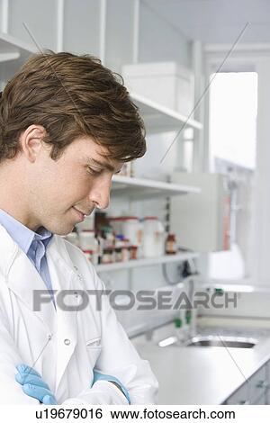 Stock Photograph - Scientist in laboratory. Fotosearch