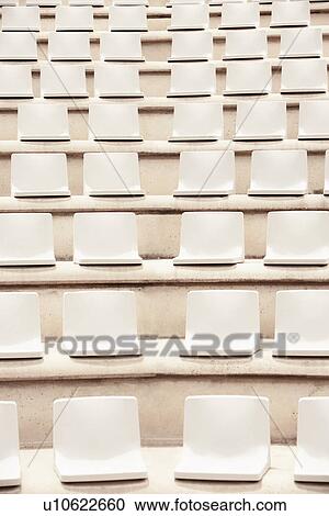 Stock Image - Seats in outdoor auditorium.. Fotosearch