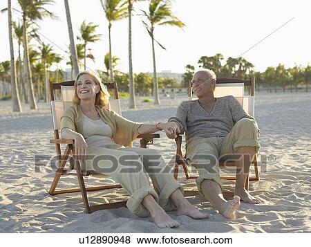 Stock Photo - Senior Couple on Beach. Fotosearch