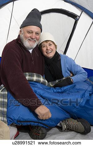 Senior couple sitting in tent, portrait View Large Photo Image Stock Image - Senior couple sitting in tent, portrait. Fotosearch