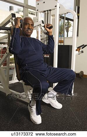Stock Image - Senior Man Weightlifting. Fotosearch
