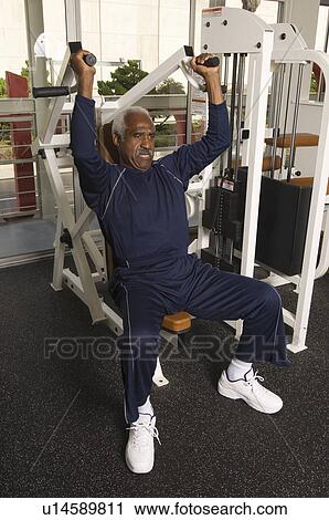 Stock Image - Senior Man Weightlifting. Fotosearch