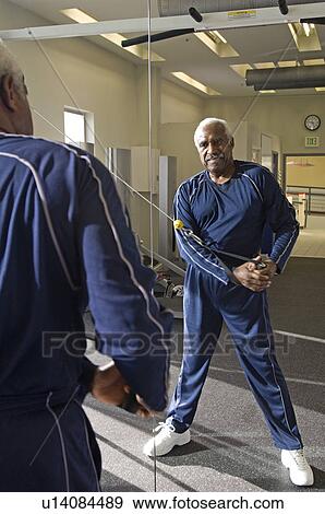 Senior Man Weightlifting View Large Photo Image Stock Photo - Senior Man Weightlifting. Fotosearch
