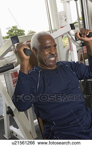 Stock Photograph - Senior Man Weightlifting. Fotosearch