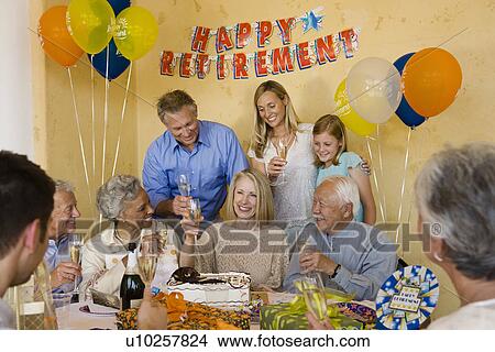 Picture - Senior woman celebrating start of retirement. Fotosearch
