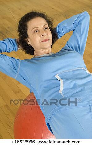 Senior Woman Doing Sit-ups View Large Photo Image Stock Photograph - Senior Woman Doing Sit-ups. Fotosearch
