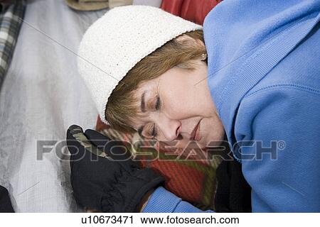 Senior woman sleeping in a tent View Large Photo Image Stock Image - Senior woman sleeping in a tent. Fotosearch