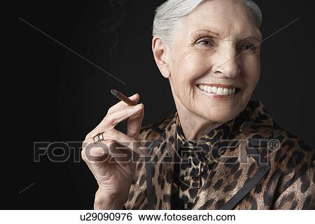 Senior Woman Smoking Cigarillo View Large Photo Image Stock Photograph - Senior Woman Smoking Cigarillo. Fotosearch