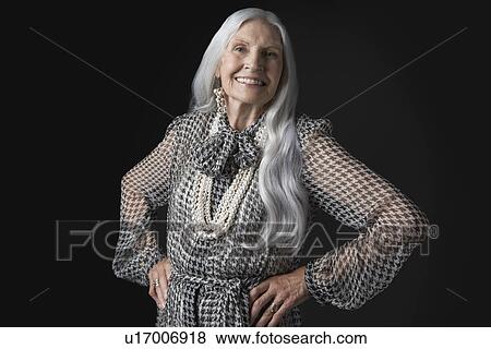 Stock Photo - Senior Woman with Hands on Hips. Fotosearch