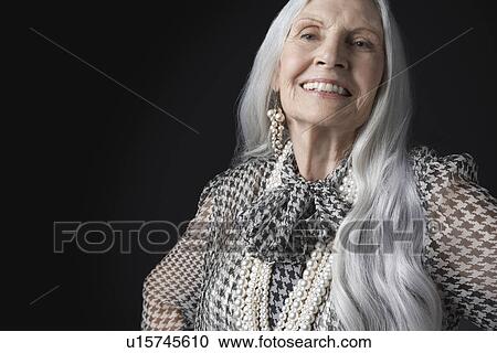 Stock Image - Senior Woman with Long Hair. Fotosearch