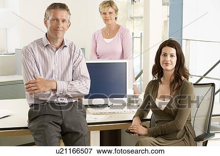 Small group of office workers, portrait View Large Photo Image Stock Photo - Small group of office workers, portrait. Fotosearch
