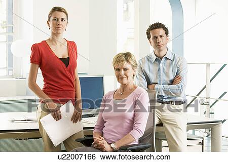 Stock Photograph - Small group of office workers, portrait. Fotosearch