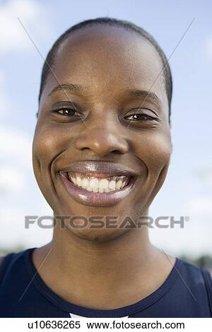 Smiling female athlete, portrait View Large Photo Image Stock Photography - Smiling female athlete, portrait. Fotosearch
