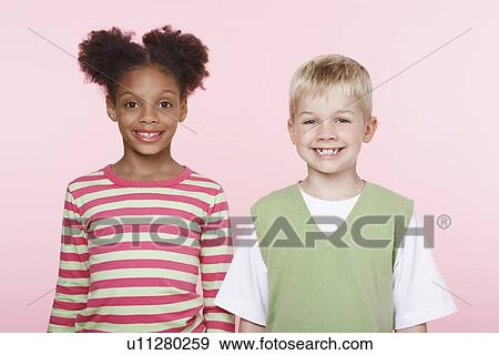 Stock Photo - Smiling Girl and Boy Side by Side. Fotosearch