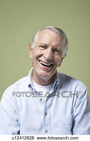 Smiling Senior Man, head tilted View Large Photo Image Stock Photo - Smiling Senior Man, head tilted. Fotosearch