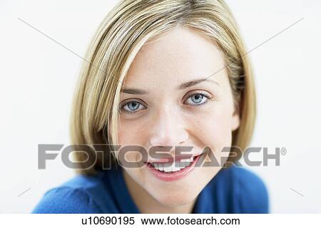 Stock Photography - Smiling Young Woman, portrait, close up. Fotosearch