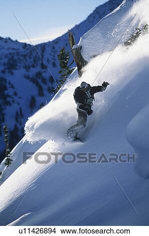 Snowboarder on mountain slope View Large Photo Image Picture - Snowboarder on mountain slope. Fotosearch