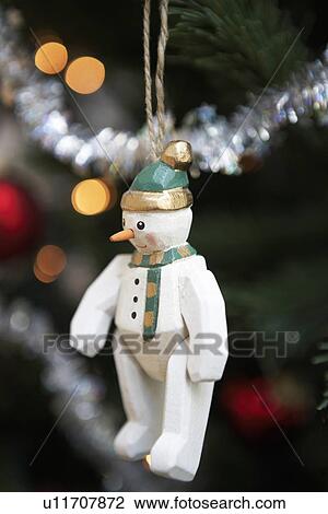 Snowman christmas decoration hanging from christmas tree, close up View Large Photo Image Stock Image - Snowman christmas decoration hanging from christmas tree, close up. Fotosearch
