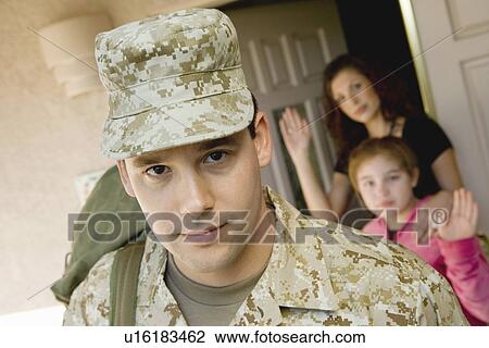 Soldier leaving family outside home View Large Photo Image Stock Image - Soldier leaving family outside home. Fotosearch