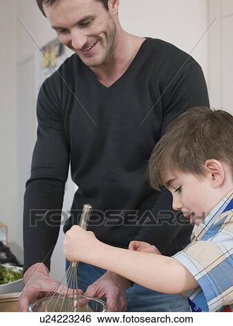 Son Helping Father in Kitchen View Large Photo Image Stock Photograph - Son Helping Father in Kitchen. Fotosearch