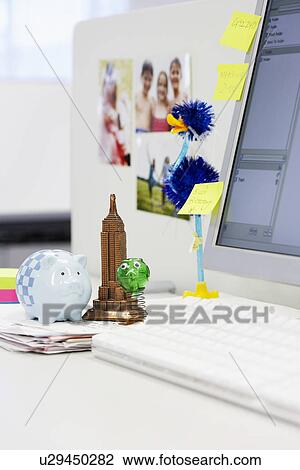 Souvenirs on Desk by computer in office View Large Photo Image Stock Image - Souvenirs on Desk by computer in office. Fotosearch