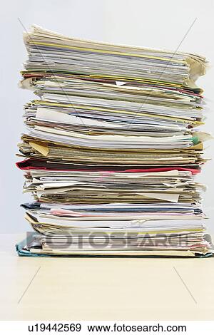 Stack of Files on desk View Large Photo Image Stock Photo - Stack of Files on desk. Fotosearch