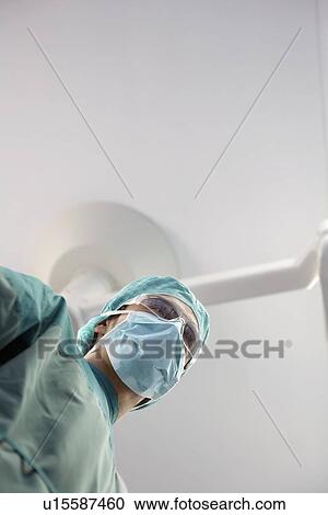 Surgeon in operating theatre, personal perspective View Large Photo Image Stock Image - Surgeon in operating theatre, personal perspective. Fotosearch