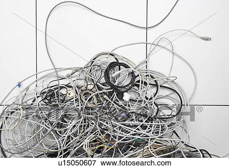 Stock Photo - Tangle of computer wires in office. Fotosearch