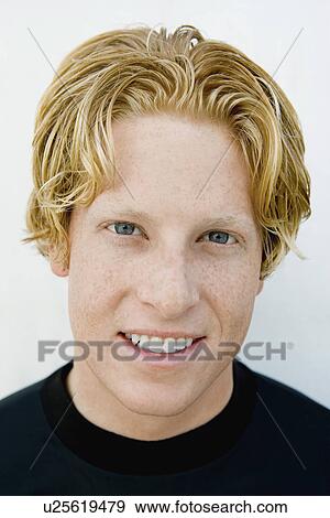Teenage boy (16-19), (close-up), (portrait) View Large Photo Image Stock Photo - Teenage boy (16-19), (close-up), (portrait). Fotosearch