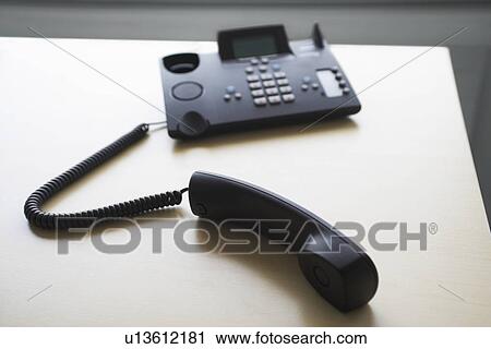 Telephone off the hook, elevated view View Large Photo Image Stock Image - Telephone off the hook, elevated view. Fotosearch