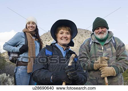 Three hikers View Large Photo Image Stock Image - Three hikers. Fotosearch
