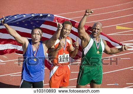 Three male athletes enjoying victory, portrait View Large Photo Image Stock Image - Three male athletes enjoying victory, portrait. Fotosearch