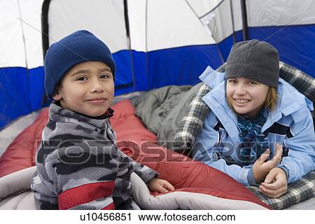 Two children in tent View Large Photo Image Stock Image - Two children in tent. Fotosearch