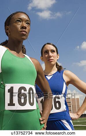 Two female track athletes View Large Photo Image Picture - Two female track athletes. Fotosearch