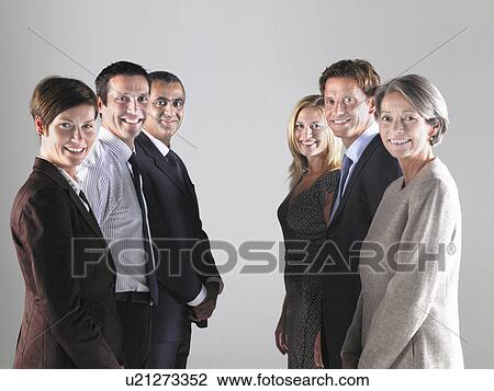 Two groups of businesspeople in two rows View Large Photo Image Stock Image - Two groups of businesspeople in two rows. Fotosearch
