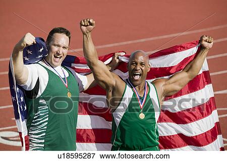 Two male athletes enjoying victory, portrait View Large Photo Image Stock Photo - Two male athletes enjoying victory, portrait. Fotosearch